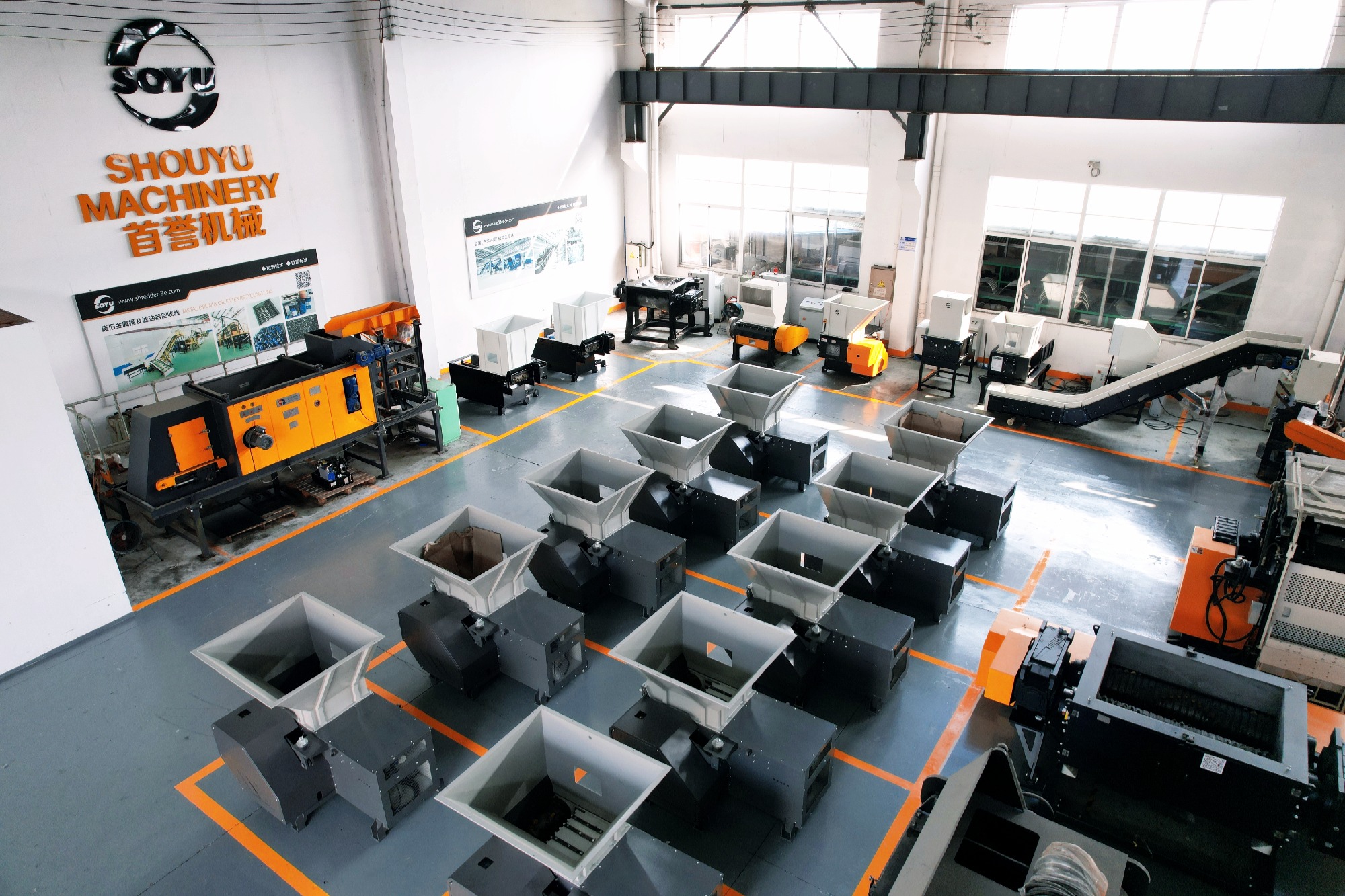 A showroom displaying various industrial shredder models