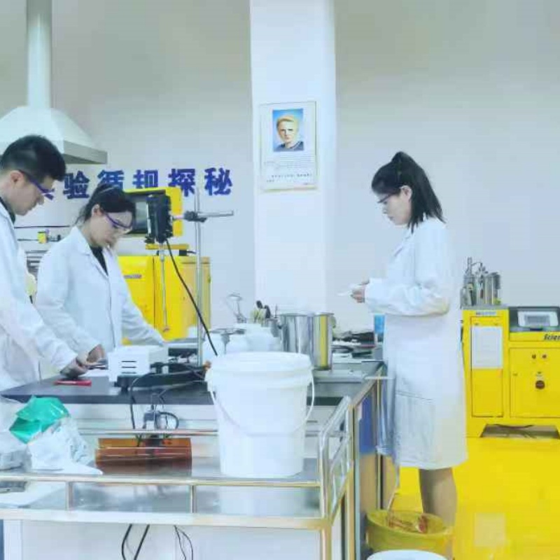 Technician performing material analysis