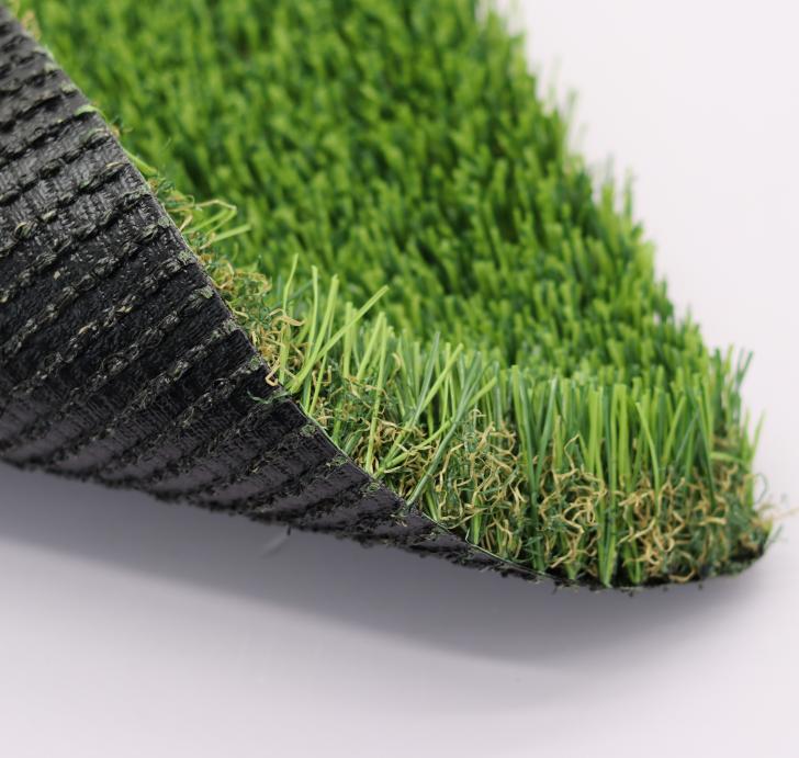 Close-up of artificial turf structure showing UV-stabilized yarn and backing layers