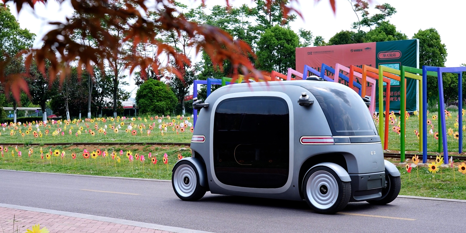 PIX Moving RoboBus in a park setting