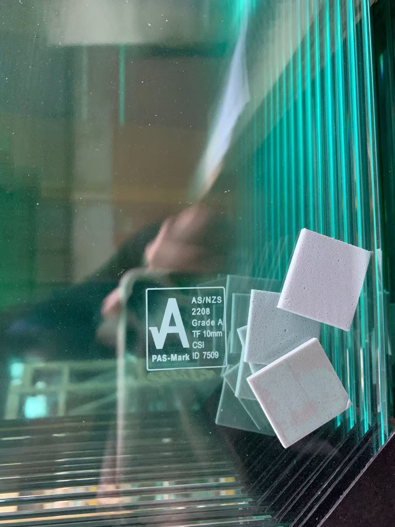 Custom glass logo engraving on tempered glass edge