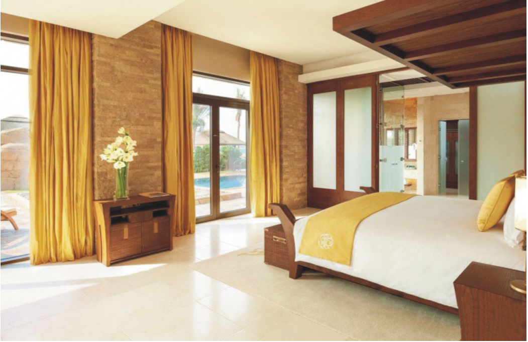 Guest room at Sofitel Dubai The Palm Resort And Spa furnished with custom RICHART furniture