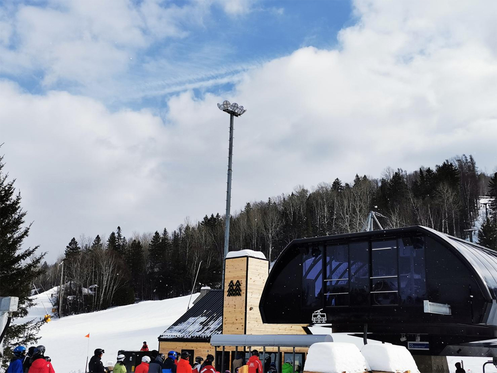High mast LED lighting installation at a ski resort in Canada
