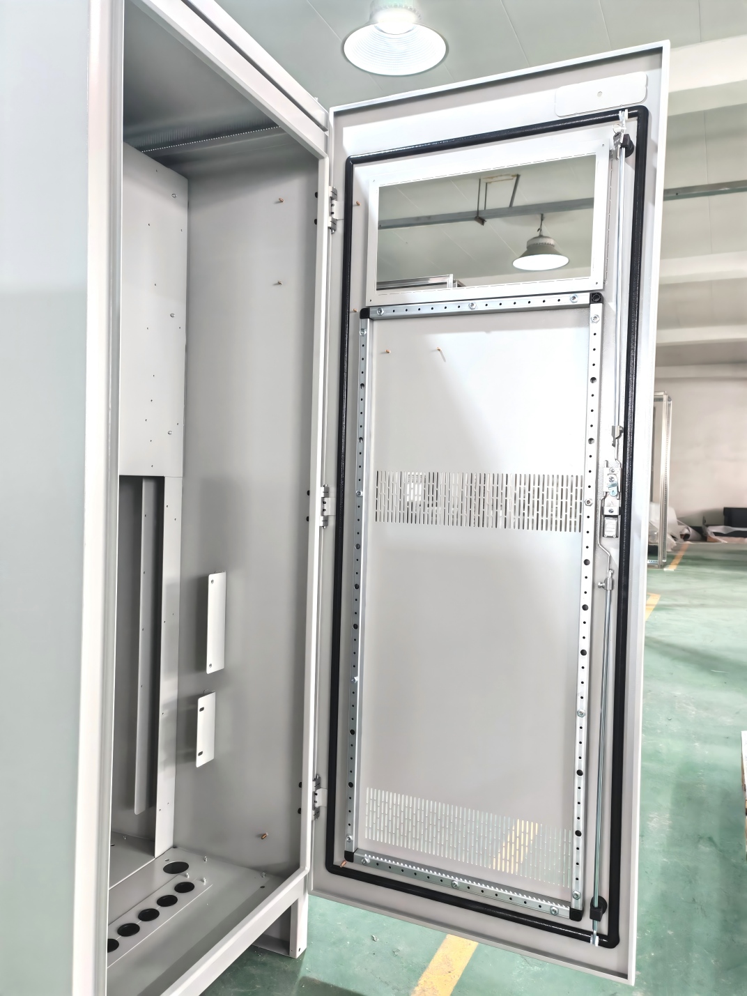 Detail of stainless steel handle lock on PLC enclosure