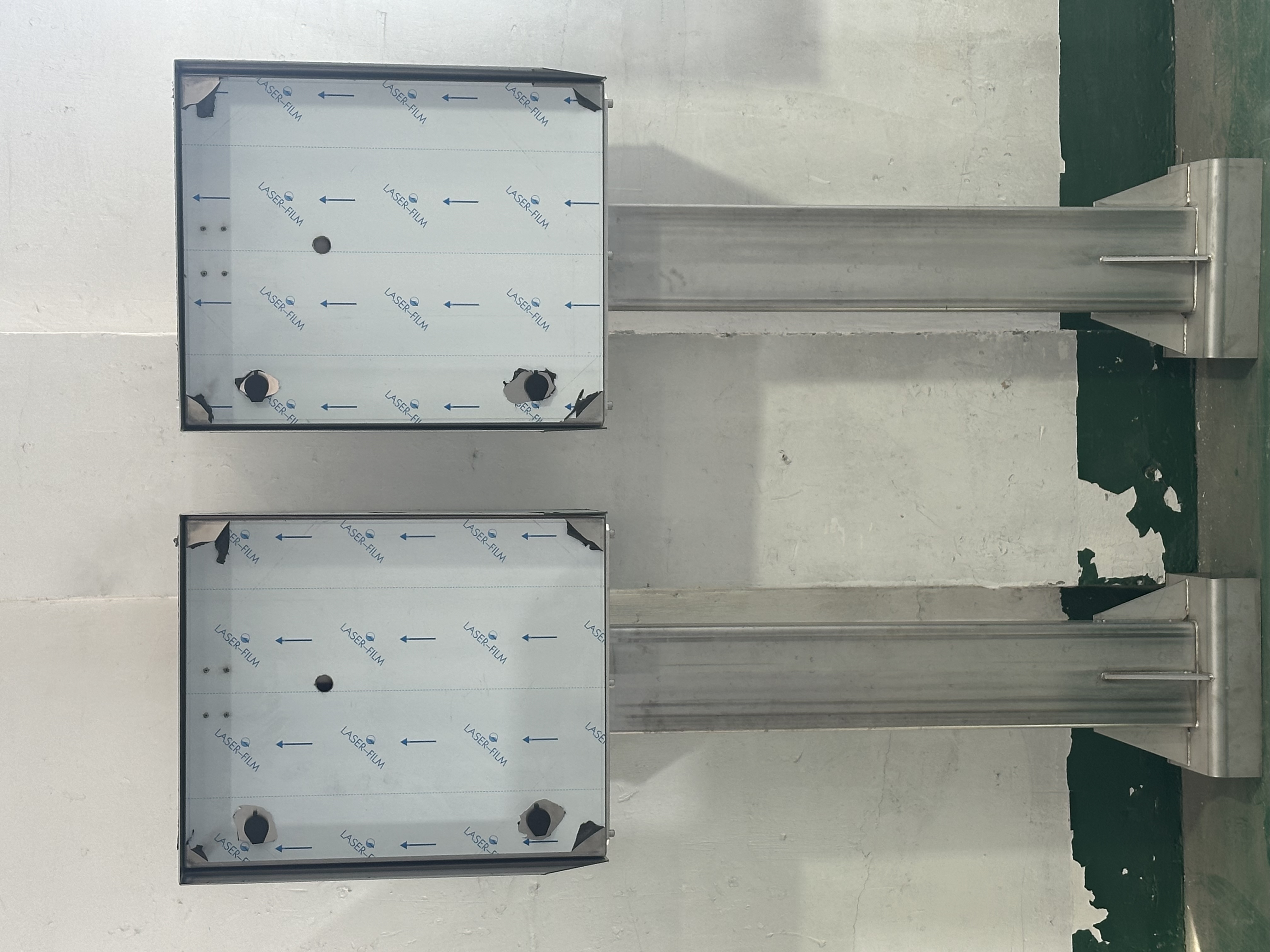 Stainless steel pedestal box side view with cable glands and grounding bar