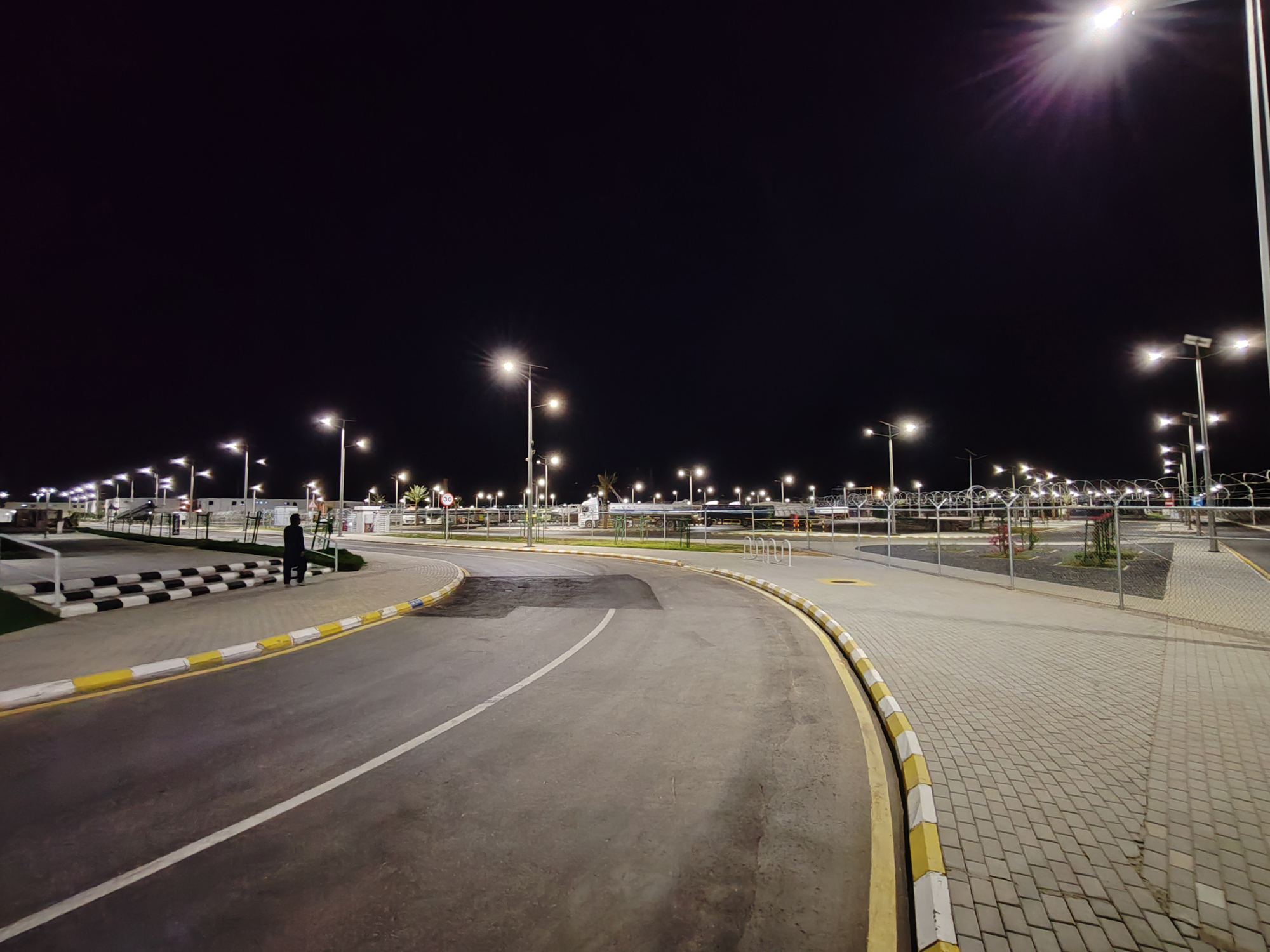 Sea port roadway lighting at night with LED high mast fixtures