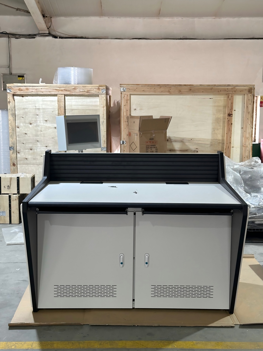 Detail of dispatch console lower door with heat dissipation louvers