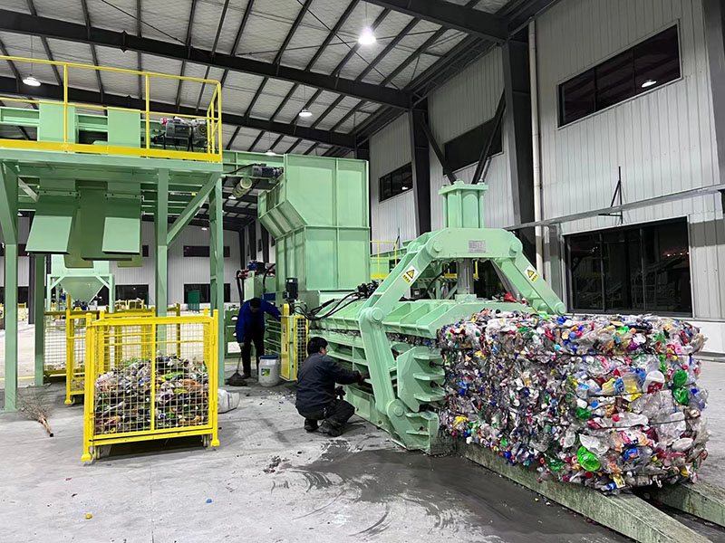 Waste paper balers installed in an industrial recycling facility