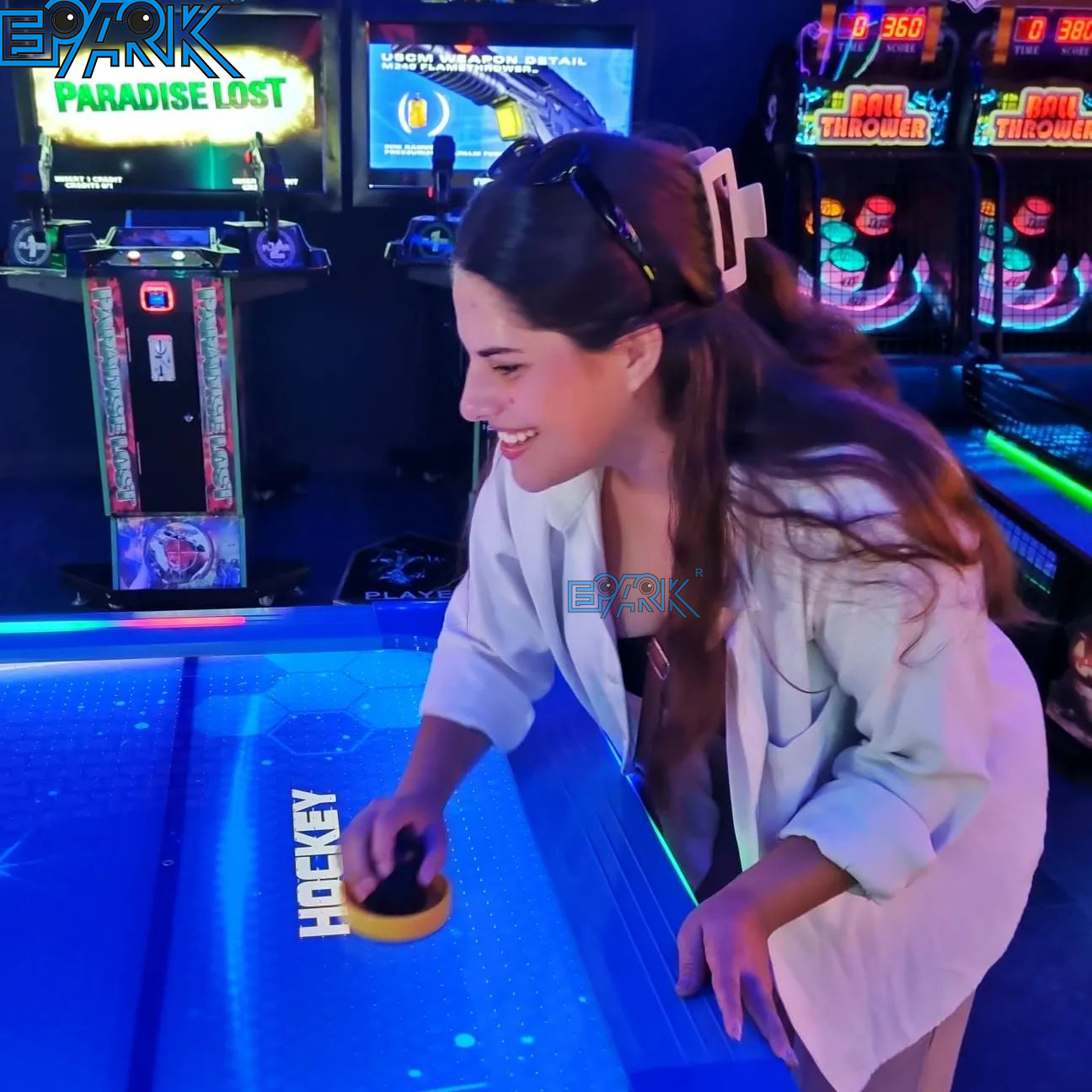 Arcade machine supplier scene showing multiple game machines in an entertainment venue