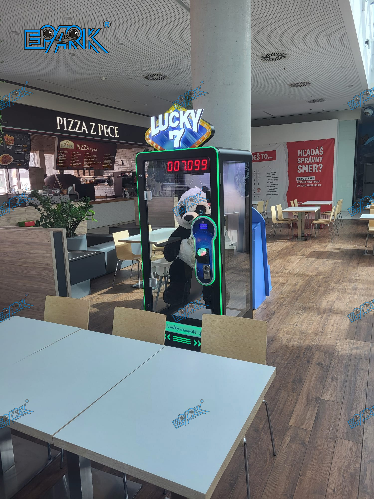 Commercial claw machines and arcade game machines operating inside a shopping mall entertainment zone