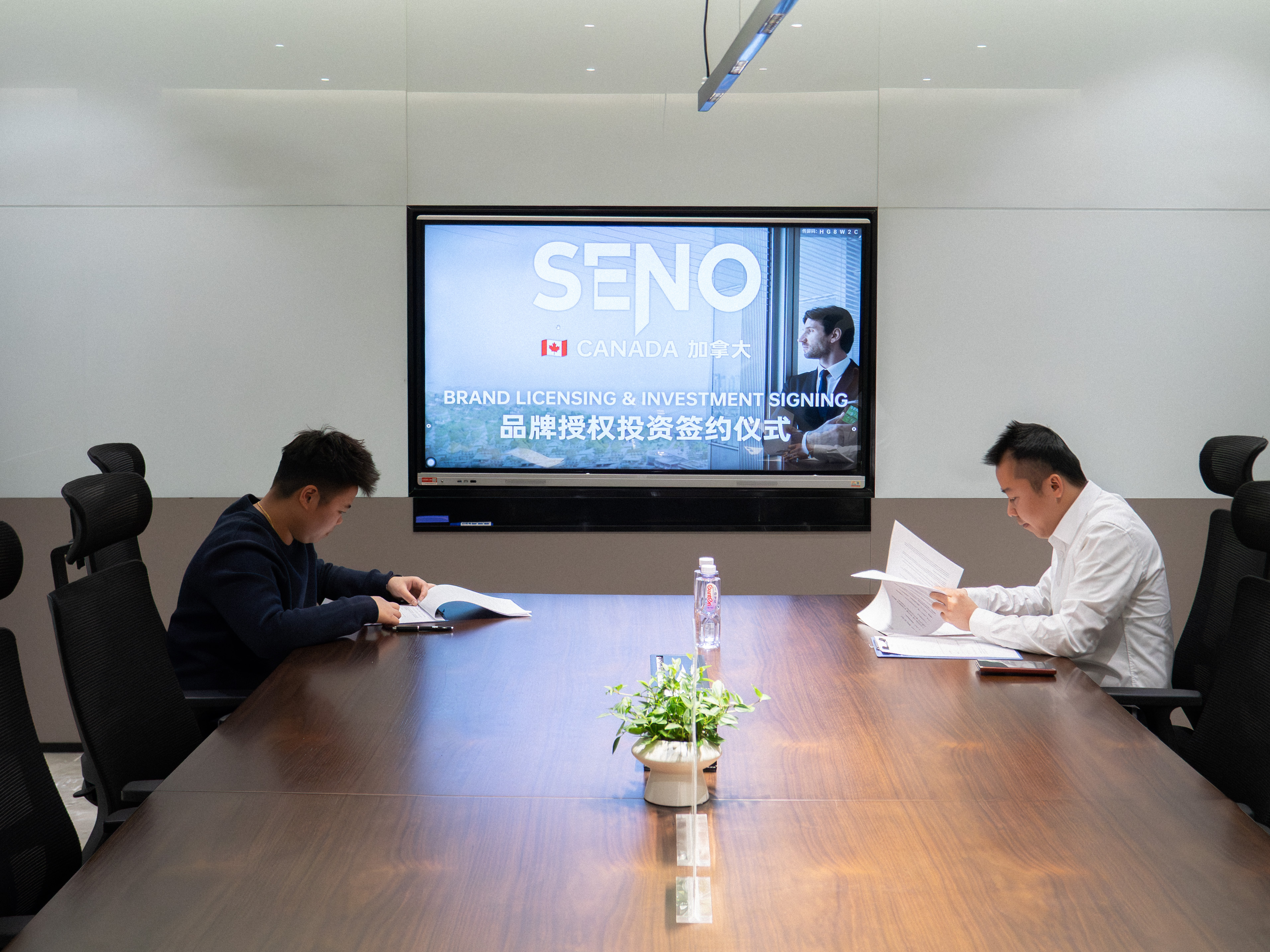 SENO signing ceremony with Canadian agent partner