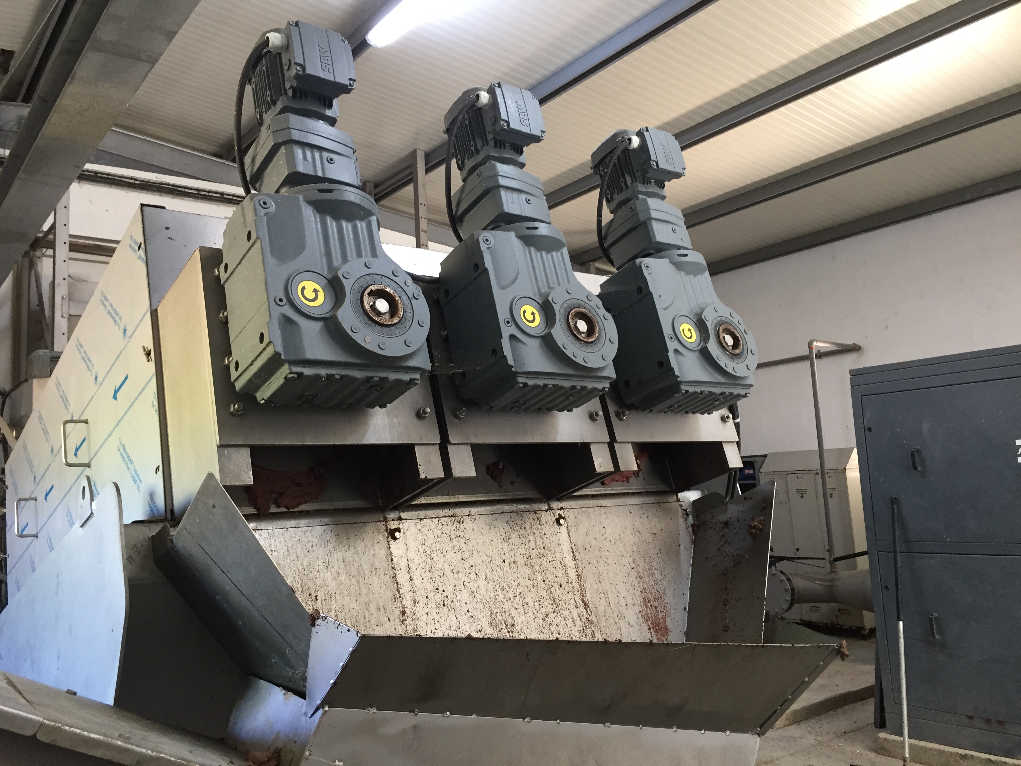 Benenv MDS303 sludge dewatering system installed at a meat processing plant in Portugal, showing low-energy DAF sludge handling
