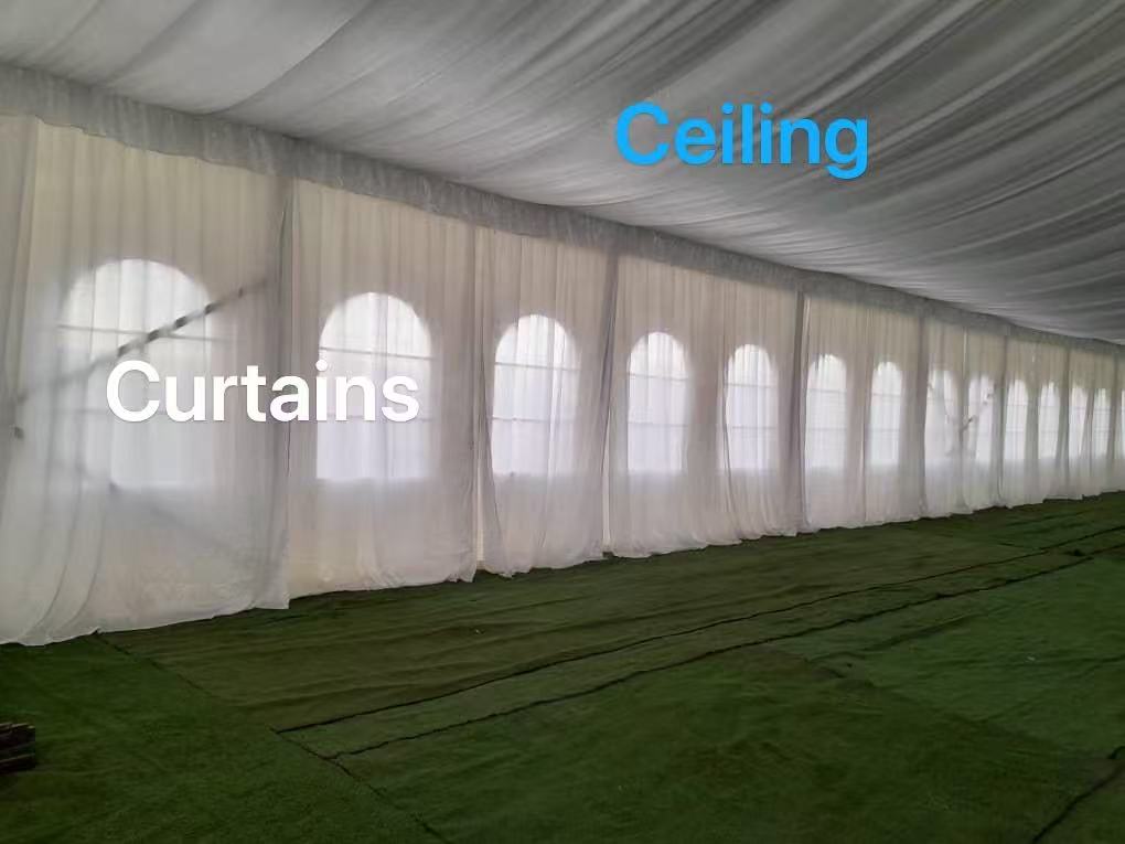 Interior lining and drapery inside a wedding tent, where decoration attaches to the frame