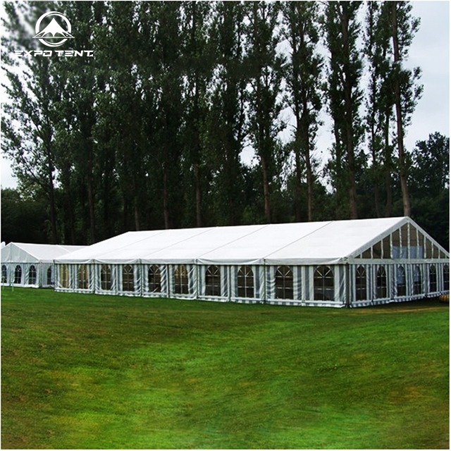 Large marquee wedding tent structure with clear span interior