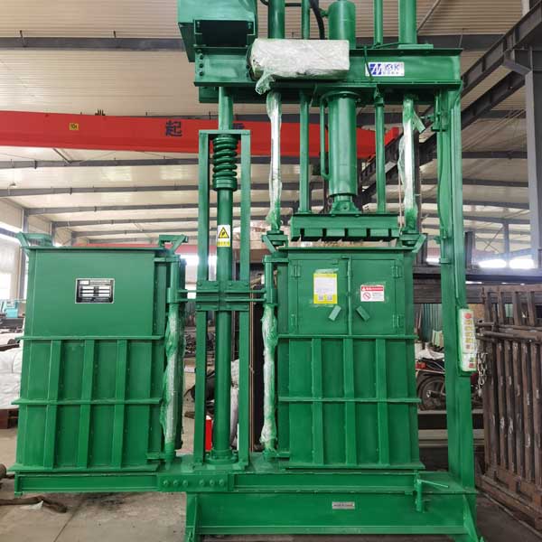 Double chambers clothes baler side view