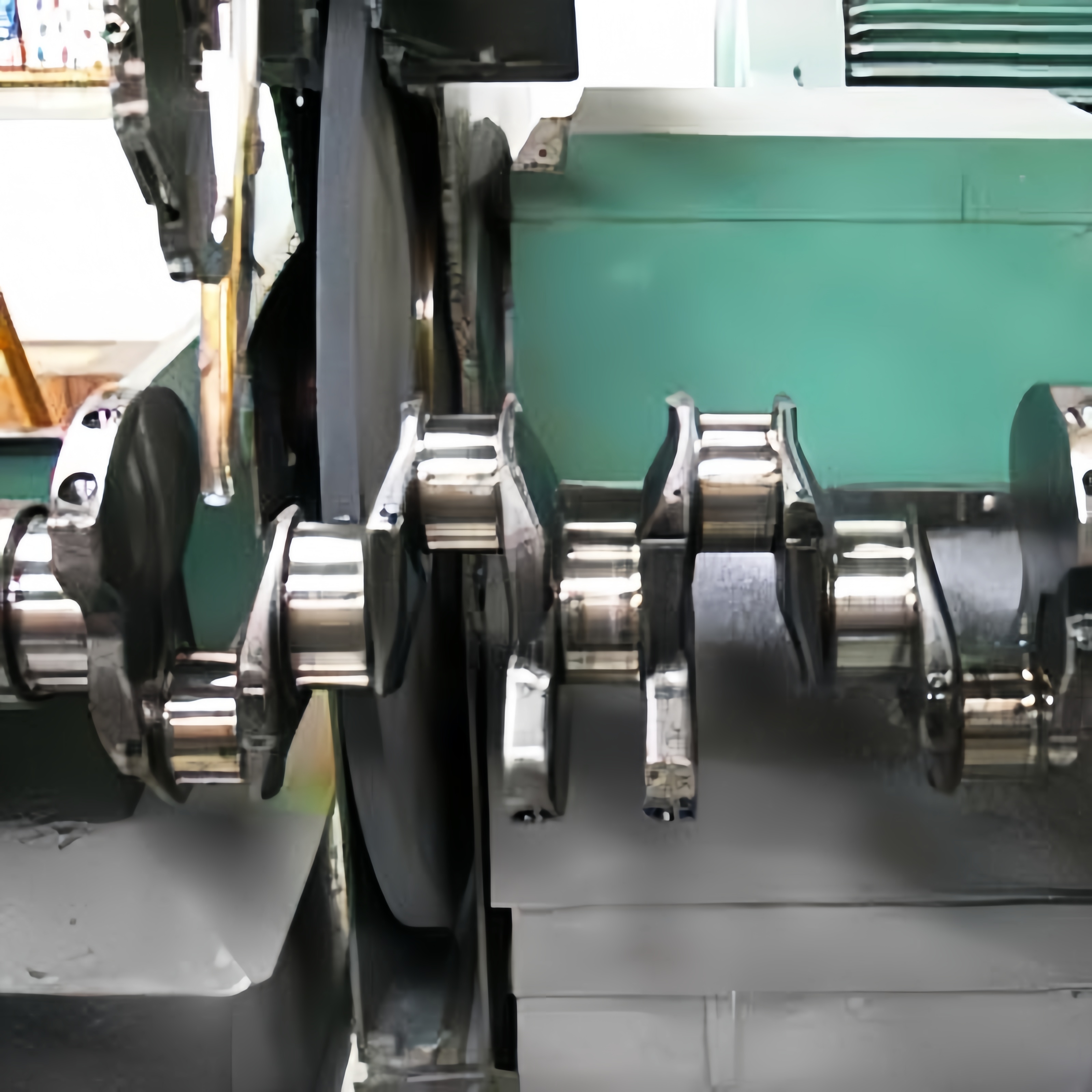 Grinding machine in an industrial production line where ceramic bonded grinding wheels are mounted