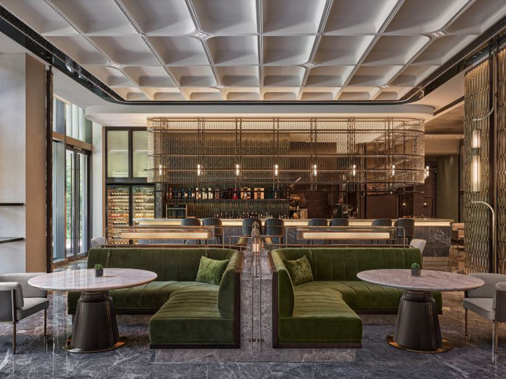 Sophisticated bar area with custom wine display and seating for five-star hotel