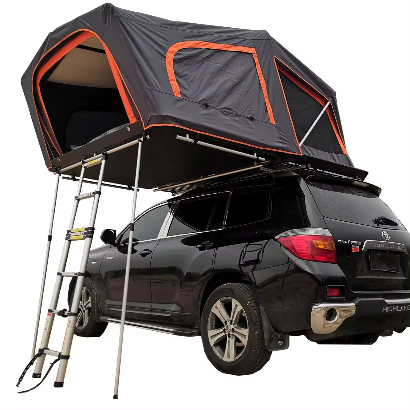 Hard shell rooftop tent mounted on vehicle