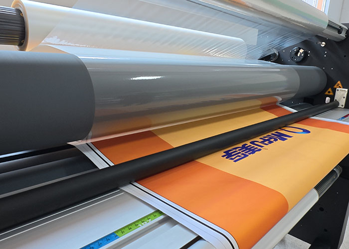 Large-format lamination application for outdoor signage