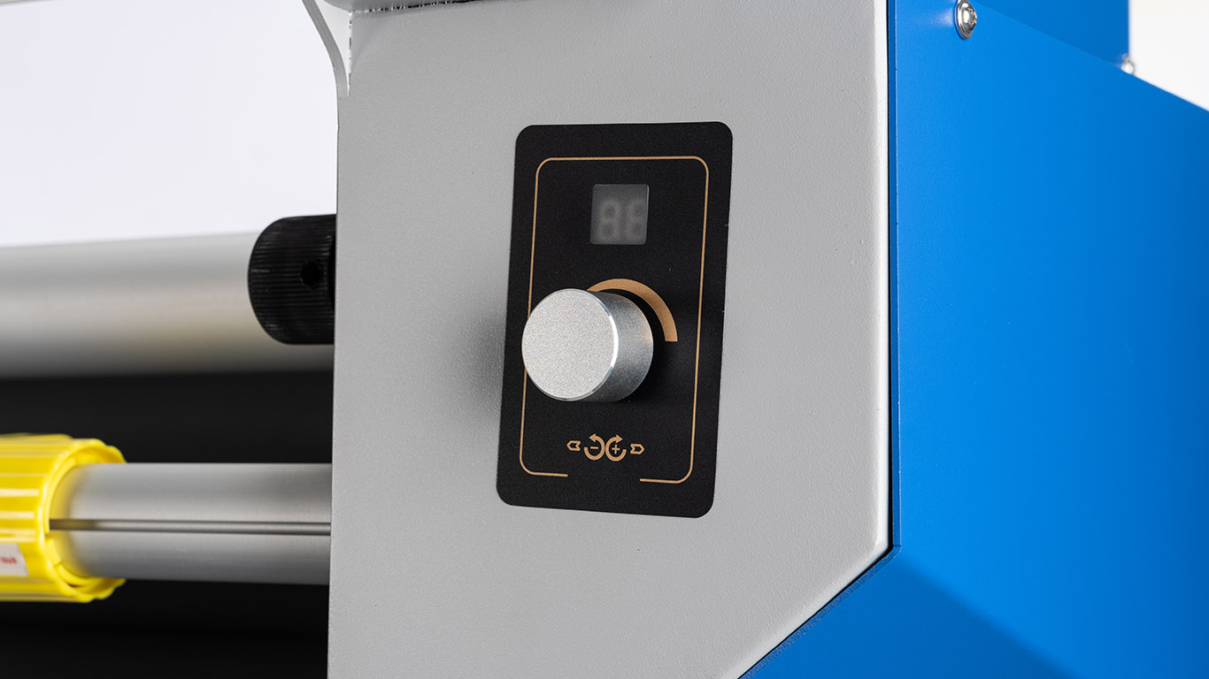 Rear-side active speed button and emergency reset on a wide format roll laminator
