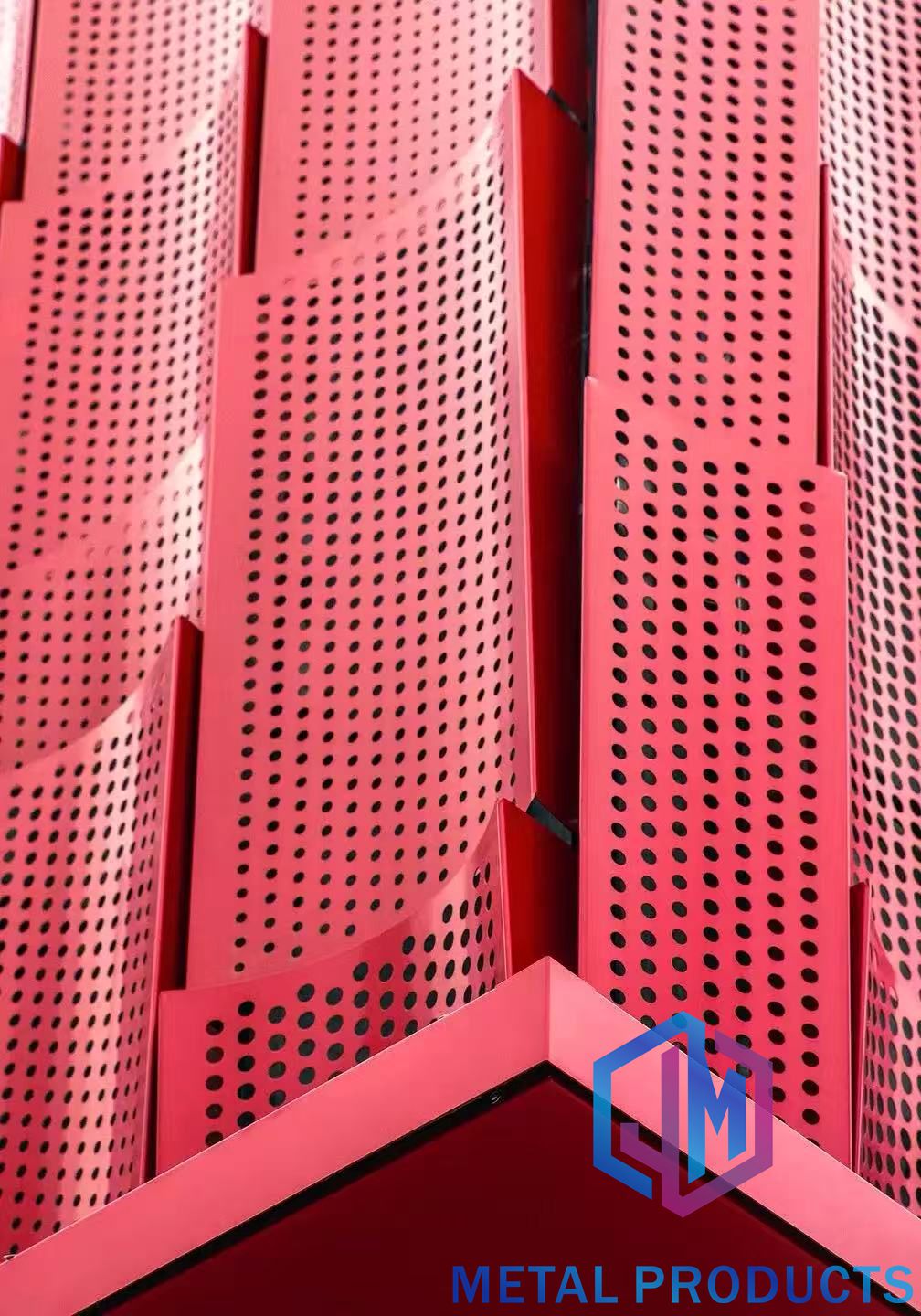 Architectural metal mesh facade panels installed as exterior cladding on a commercial building