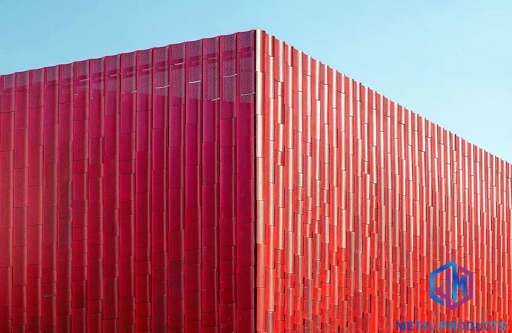 Perforated metal facade cladding panels on a commercial building exterior in China