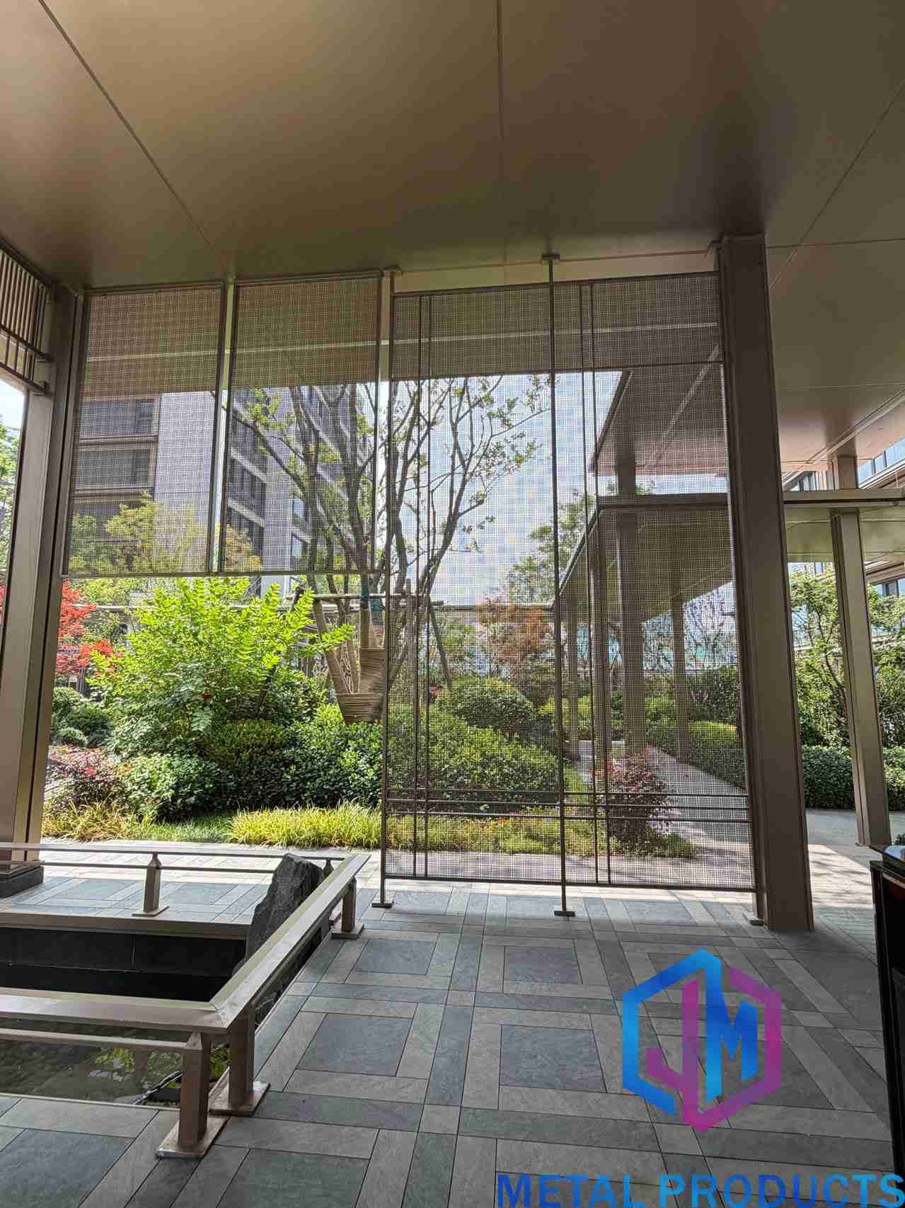 Residential courtyard metal mesh facade panels