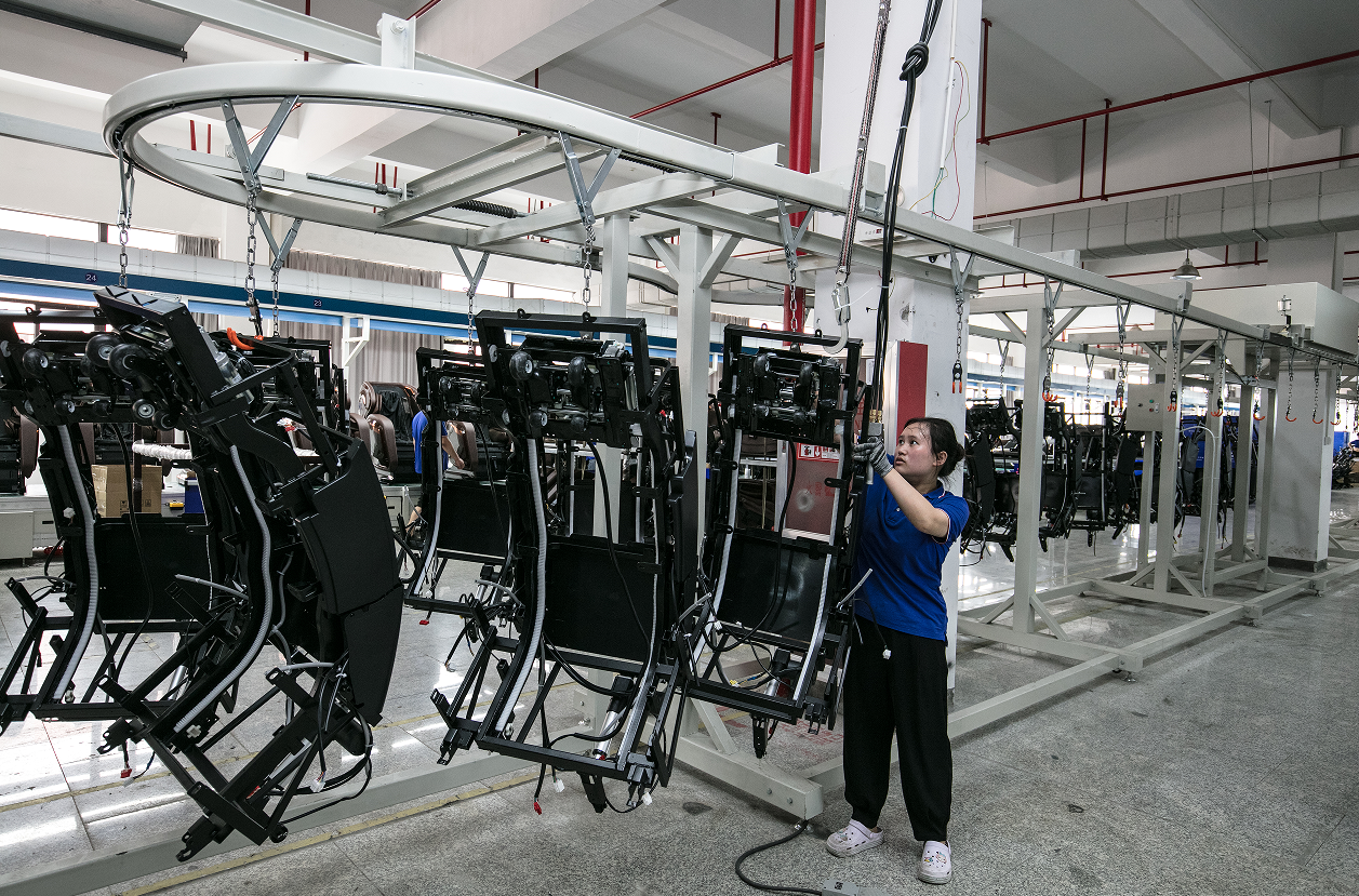Automated assembly line for 4D massage chairs at Zhouqi factory