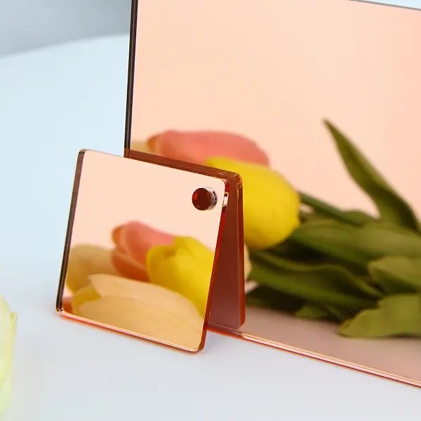 Sparkle: Incorporate rose gold mirrored acrylic sheets into your decor