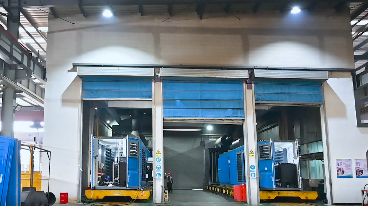 MECCA POWER production workshop showing high-power diesel generator assembly