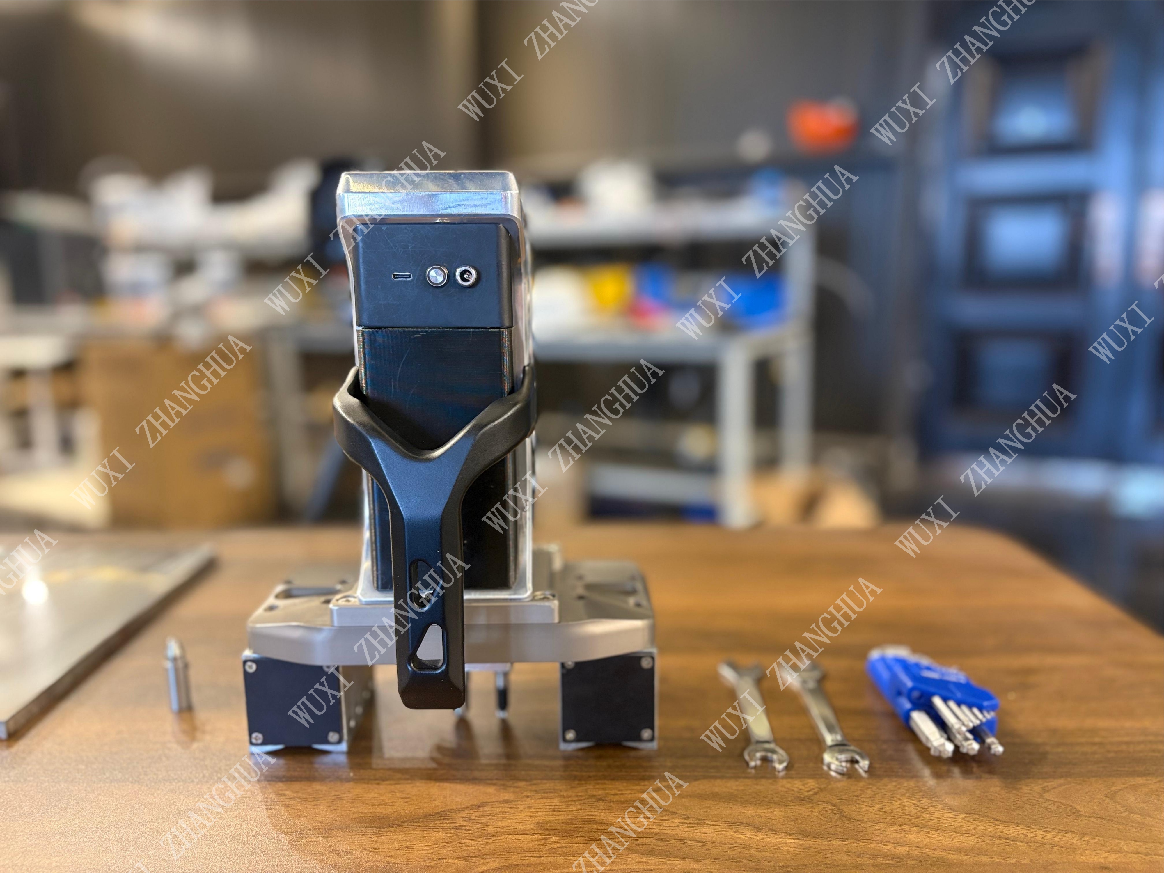 Non-Destructive Weld Stress Tester displaying longitudinal and transverse stress results