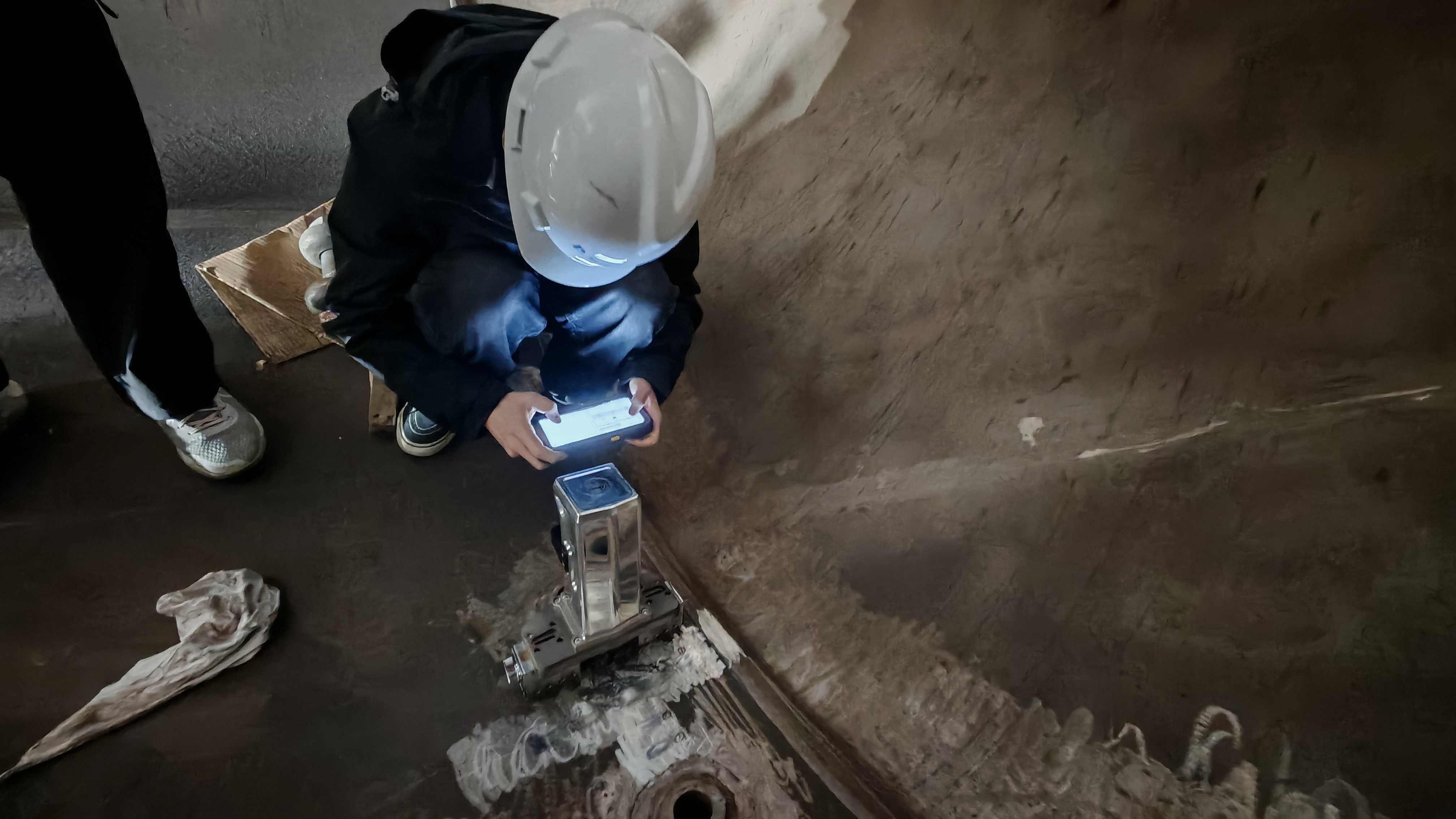 Portable indentation tester used on site for non-destructive mechanical property evaluation in a technical service setting