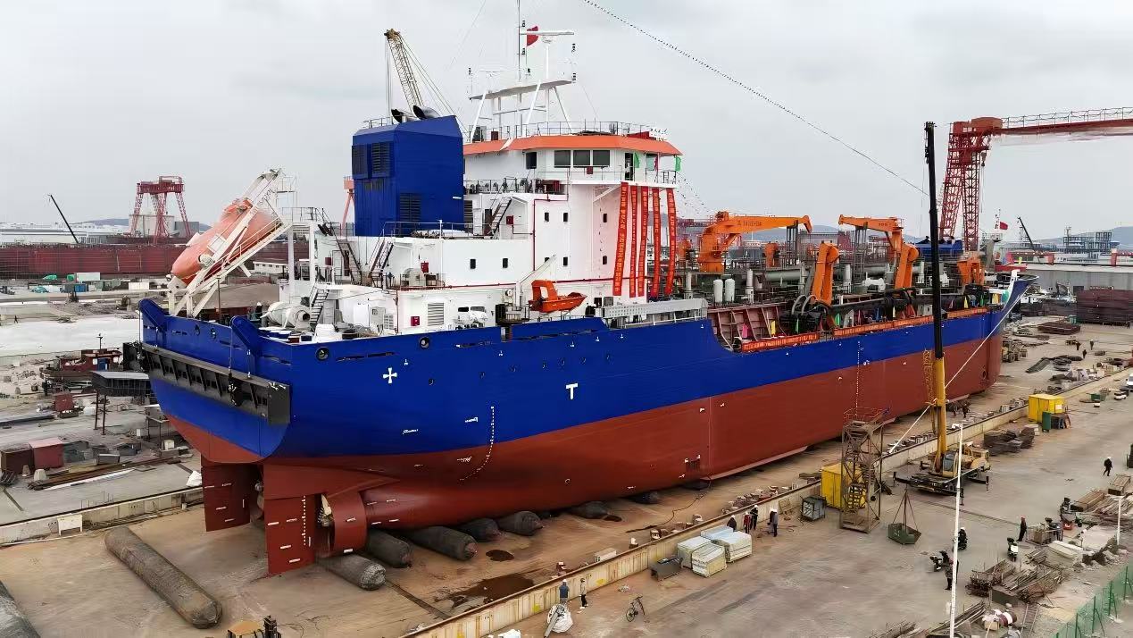 Shipyard overview showing dredger construction