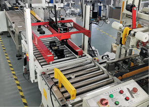 Food and beverage processing and packaging line where gear reducers drive filling, capping and conveyor stations