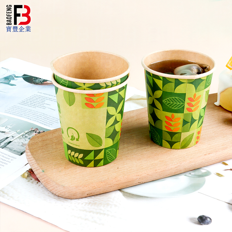 Printed coffee cups on a wooden tray for café beverage service