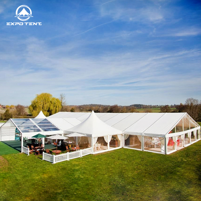 A beautiful clear wedding tent with elegant interior lighting