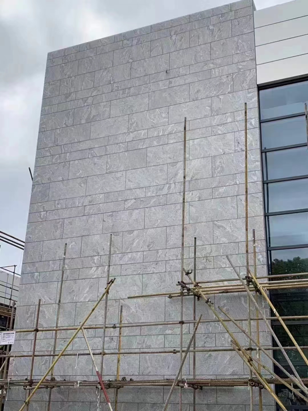 Viscount white granite building facade - exterior cladding installation