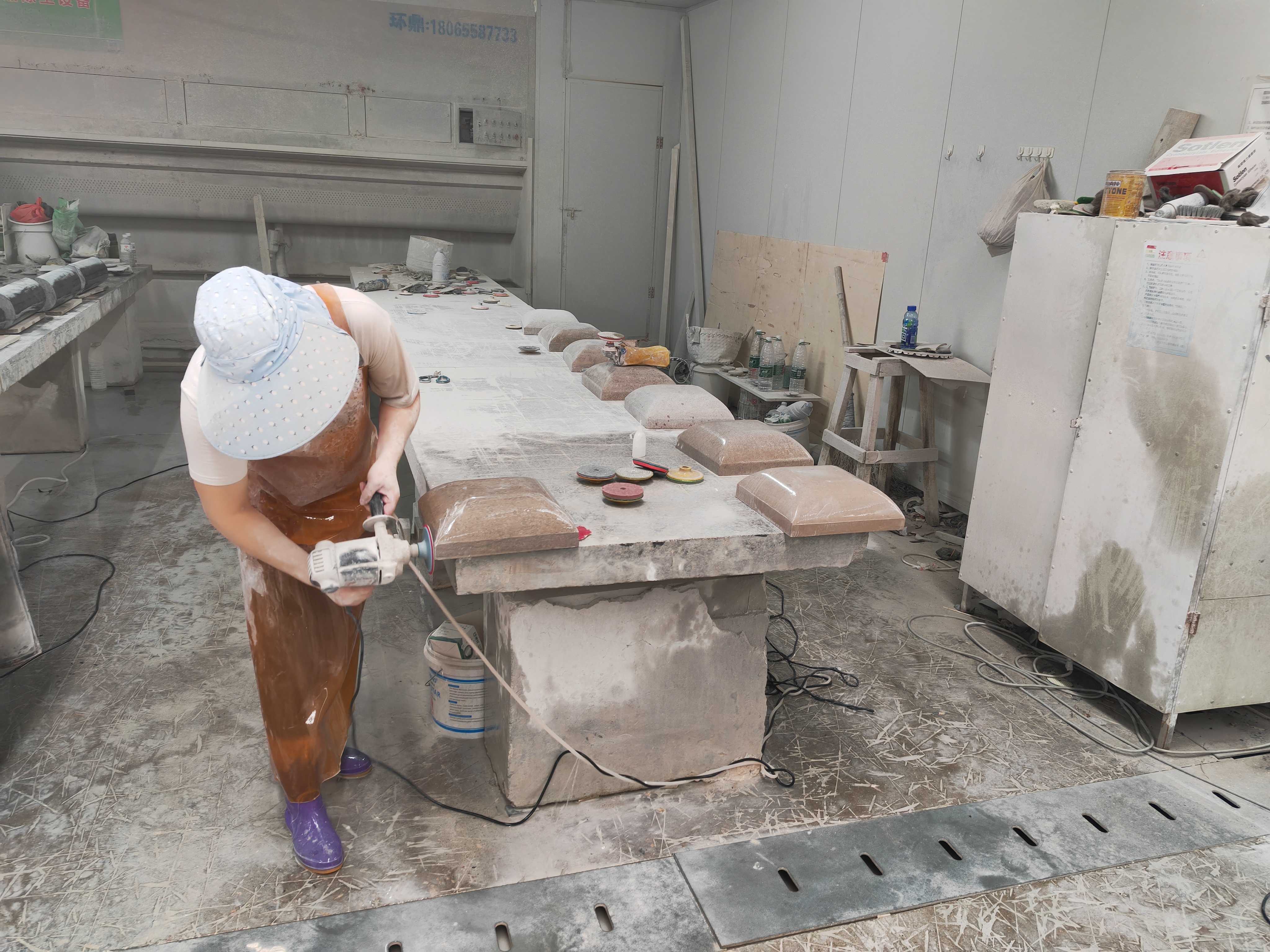 Scene of a modern natural stone processing factory with advanced machinery