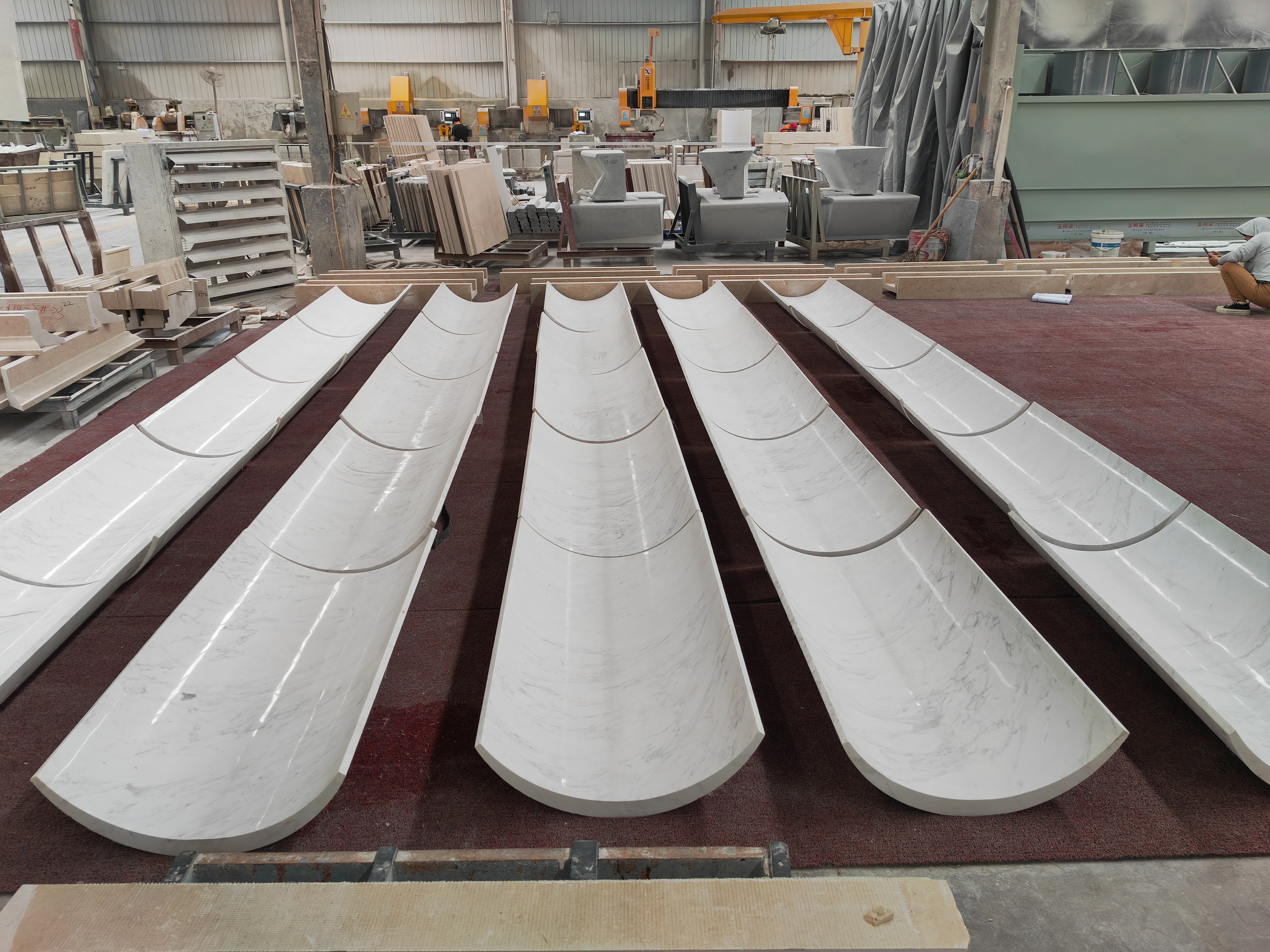 SONGJIA factory scene illustrating quality control processes and production capability for commercial marble table manufacturing