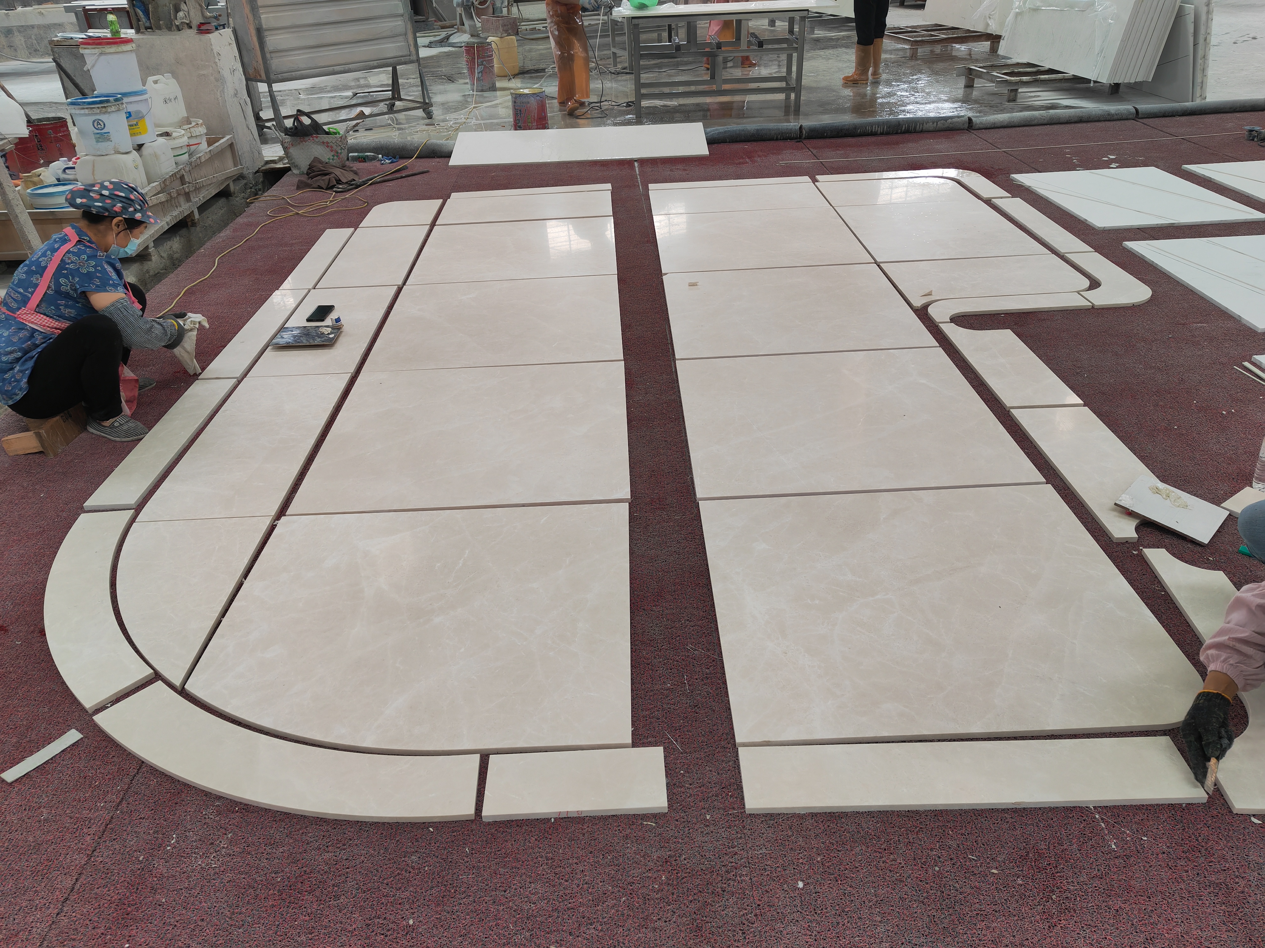 SONGJIA's stone factory workshop with advanced cutting machinery