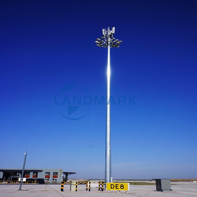 A tall high mast lighting up a large area