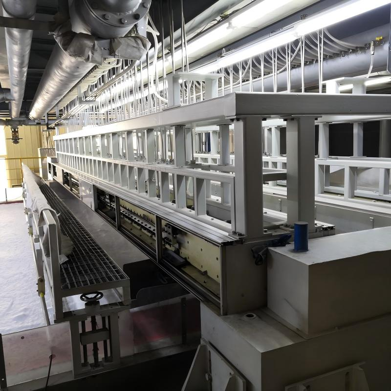 Filament web being laid on a polyester continuous filament needle-punched geotextile production line