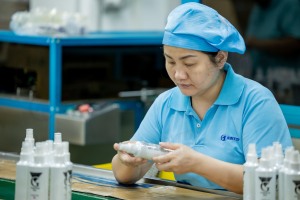 Tentop Fine Chemical Worker Operating Packaging Machine