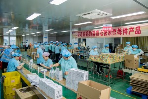 Tentop Fine Chemical Worker Operating Packaging Machine