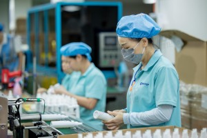 Tentop Fine Chemical Worker Operating Packaging Machine