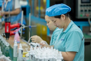 Tentop Fine Chemical Worker Operating Packaging Machine