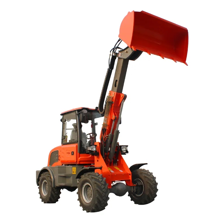 Compact wheel loader with a front bucket on a machine yard