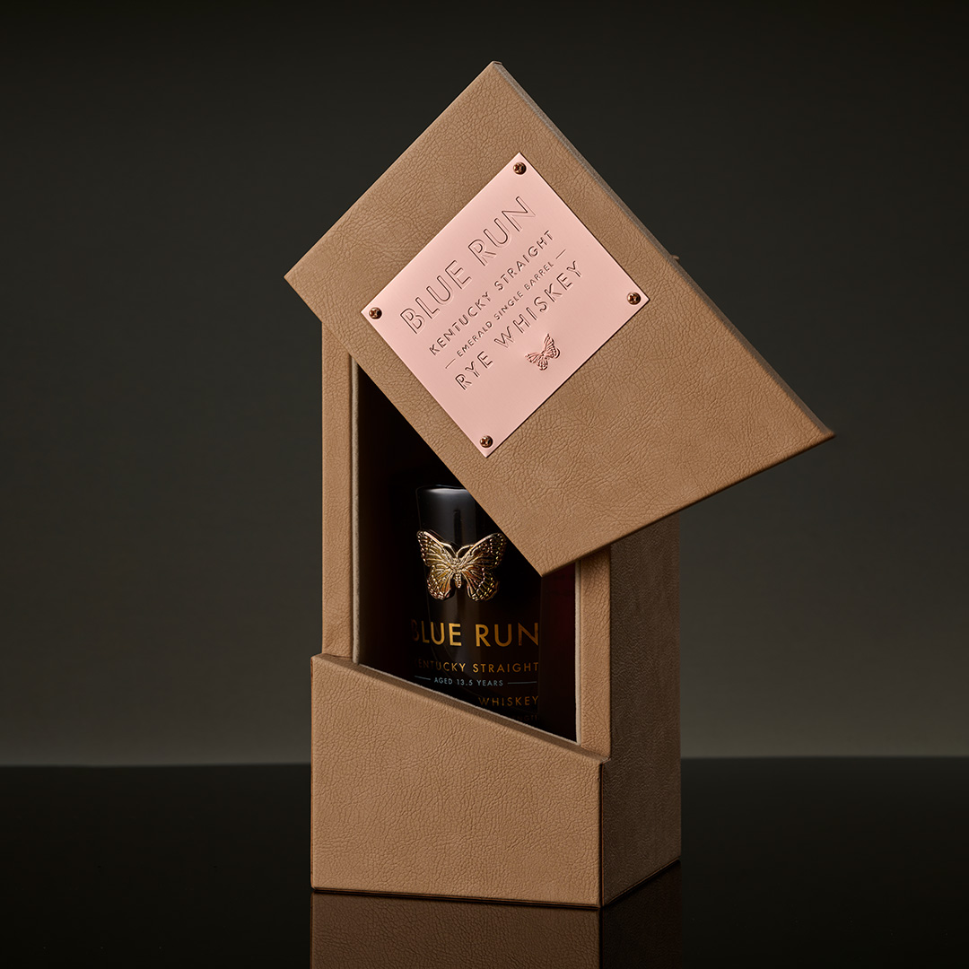 Re-engineered premium whiskey gift box structure developed from a 3,000-piece rigid box programme