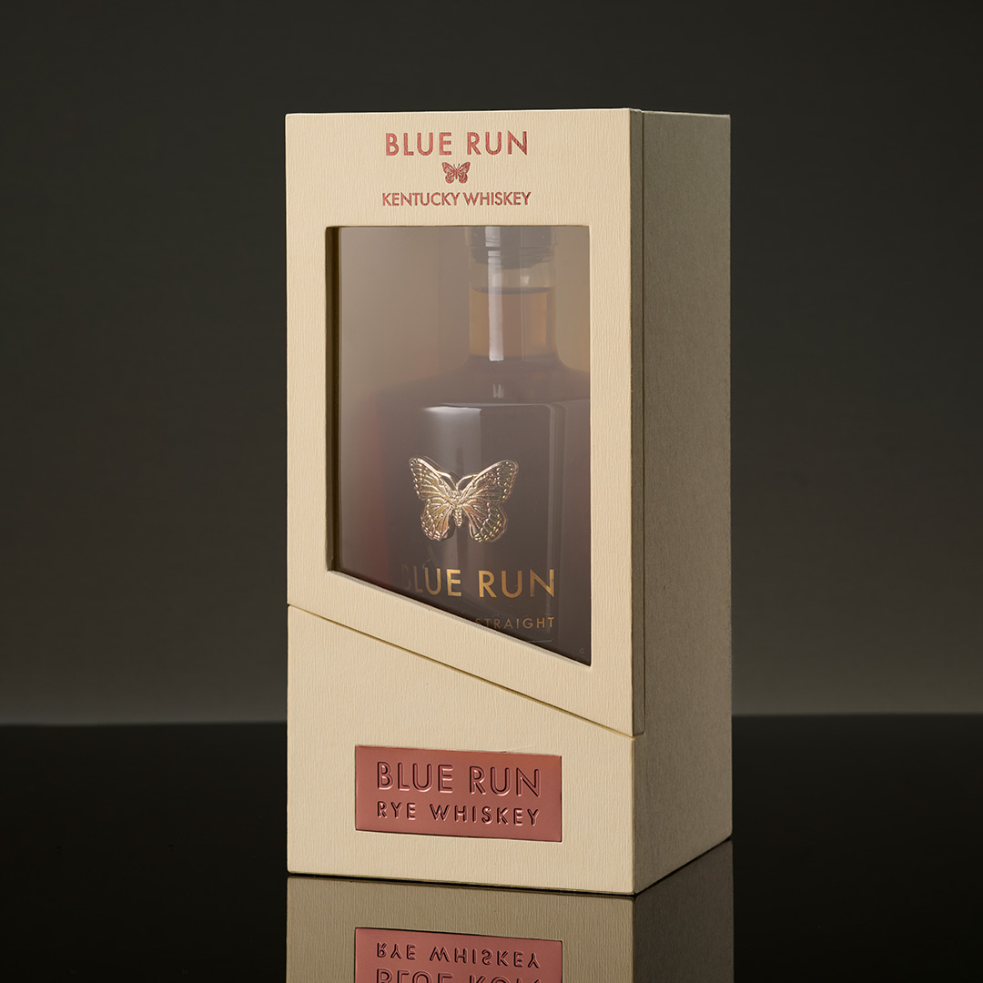 Premium whiskey rigid gift box produced for a spirits brand, showing rigid board construction and insert-protected bottle presentation