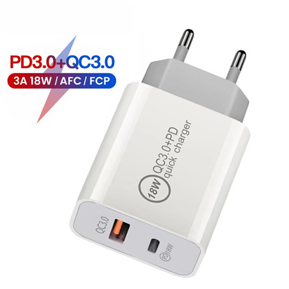 Close-up of USB C and USB A output ports on the charger